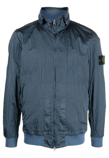 Stone Island logo-patch zip-up jacket - Toni neutri