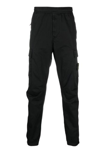 Stone Island logo-patch tapered-leg trousers - Nero