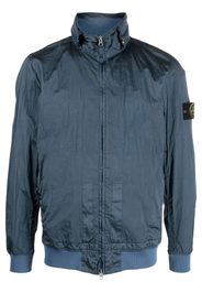 Stone Island logo-patch zip-up jacket - Toni neutri