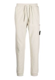 Stone Island Compass-patch cotton track pants - Toni neutri