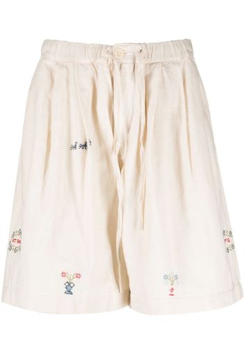 STORY mfg. embroidered-design drop-crotch shorts - Toni neutri