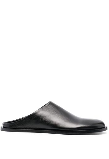 Studio Nicholson Mules Ty in pelle con suola piatta - Nero