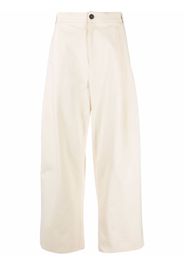 Studio Nicholson Sorte wide-leg pleated trousers - Toni neutri