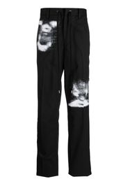 Takahiromiyashita The Soloist graphic-print drawstring-waist trousers - Nero