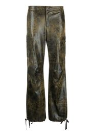 THE ANDAMANE distressed-effect tapered trousers - Nero