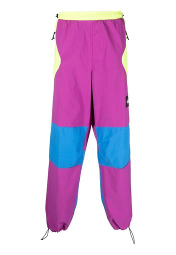 The North Face Pantaloni sportivi Carduelis con design color-block - Viola