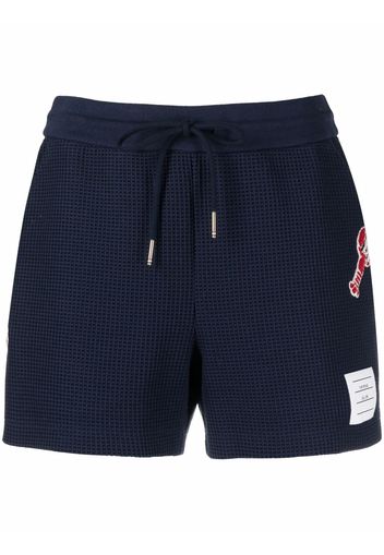 Thom Browne Pantaloni sportivi con ricamo - Blu