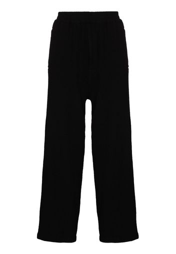 UNDERCOVER loose-fit wool track pants - Nero