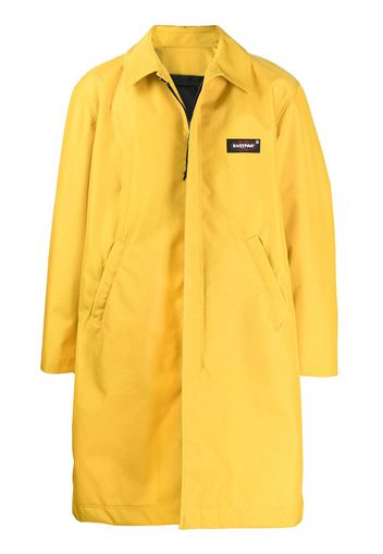 UNDERCOVER Cappotto con tasche posteriori Undercover x Eastpak - Giallo