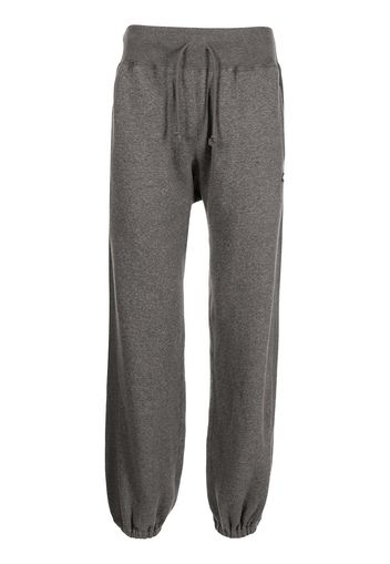 UNDERCOVER logo-patch drawstring track pants - Grigio