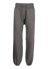 UNDERCOVER logo-patch drawstring track pants - Grigio