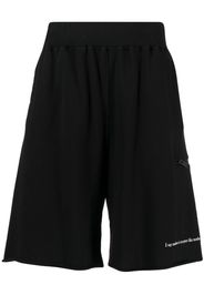 Undercover slogan-print cotton track shorts - Nero