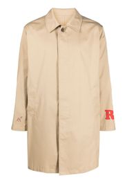 Undercover slogan-print gabardine trench coat - Toni neutri