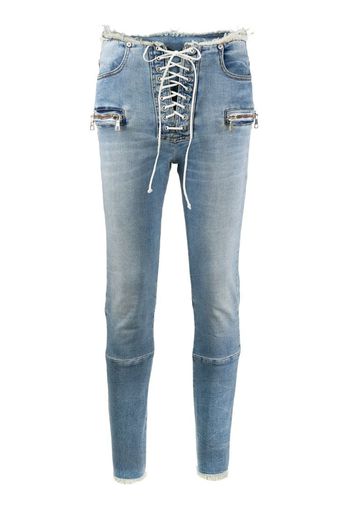 mid-rise laced skinny jeans