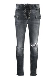 Jeans skinny con effetto vissuto