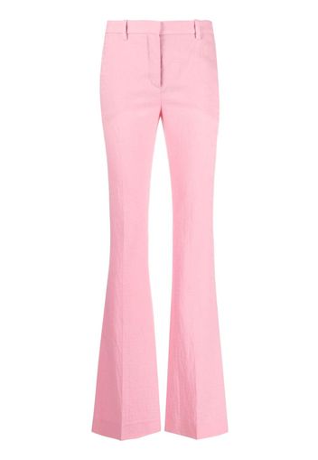 Versace Allover logo flared trousers - Rosa