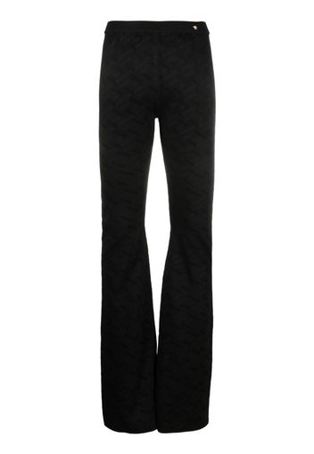 Versace Greca-knit flared trousers - Nero