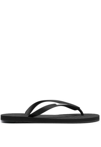 VETEMENTS logo-embossed flip flops - Nero