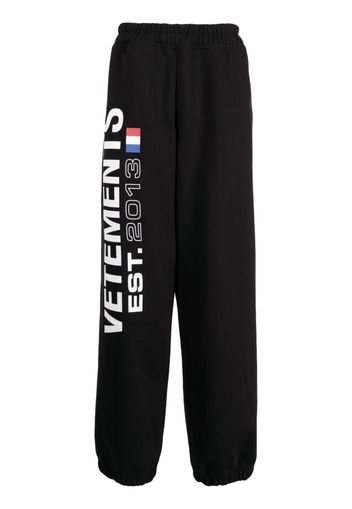 VETEMENTS Flag-logo print track pants - Nero