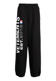 VETEMENTS Flag-logo print track pants - Nero