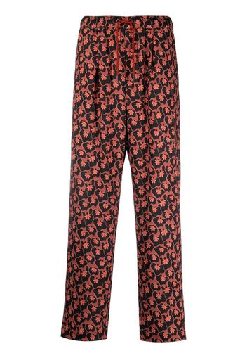 Viktor & Rolf all-over floral-print trousers - Arancione