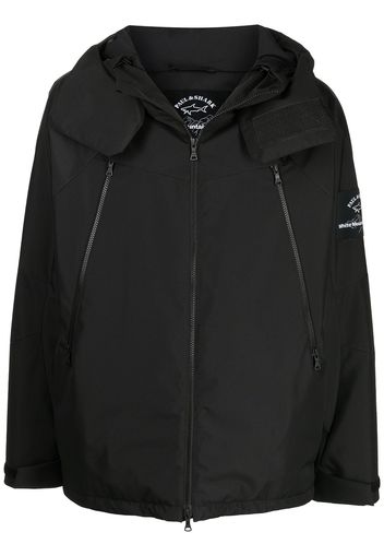 White Mountaineering logo-patch hooded jacket - Nero