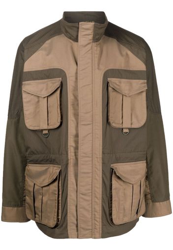 White Mountaineering panelled cargo-pocket jacket - Marrone