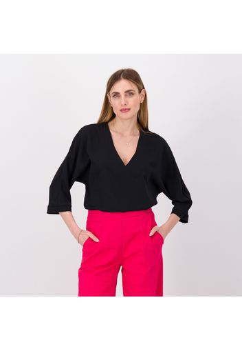 Blusa con scollo a V in raso