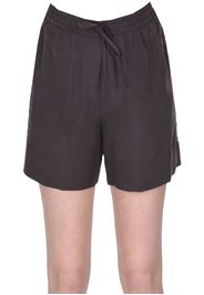 Shorts in seta