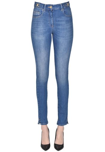 Jeans slim con dettagli in metallo