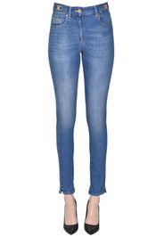 Jeans slim con dettagli in metallo