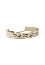 Bangle âParla con tutti. Divertiti con molti. Fidati di pochi. Dipendi da nessunoâ in acciaio dorato per Donna