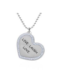 Collana in acciaio rodiato e strass a forma di cuore âLive. Laugh. Love.â per Donna