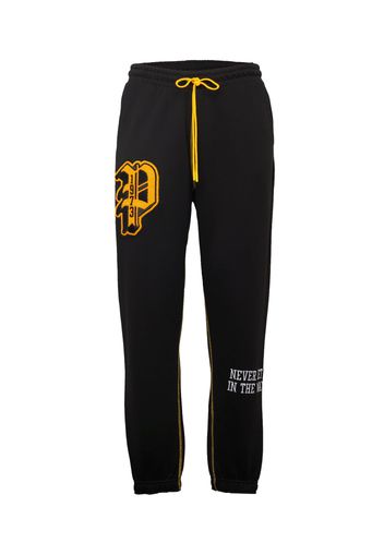 PUMA Pantaloni sportivi 'Dylan'  giallo oro / nero