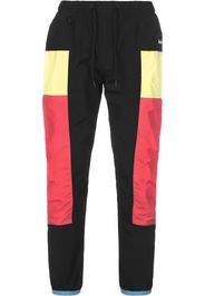 TIMBERLAND Pantaloni  nero / rosso / giallo / blu