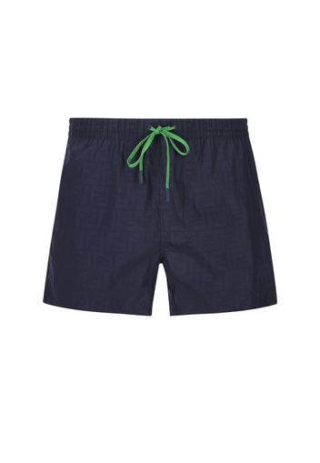 Boxer Da Mare In NylonBoxer realizzati in nylon di colore blu navy, con det-taglio di tessuto che se bagnato rileva il motivo FF nelle stesse tonalità.