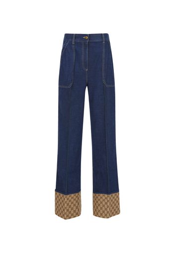 Pantaloni in denim con risvolto GG