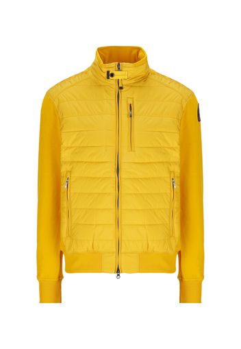 Giacca Parajumpers realizzata in poliestere di colore giallo con dettaglio di logo applicato sul braccio sinistro.