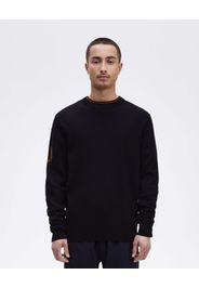 Maglia blu girocollo in misto lana con logo jacquard caramello sulla manica