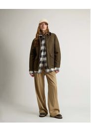 Giacone verde militare Woolrich in Ramar Cloth con colletto blu in velluto