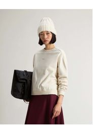 Felpa color latte Woolrich in cotone con scollo a giro e scritta logo stampata sul petto