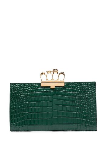 embossed knuckleduster clutch bag