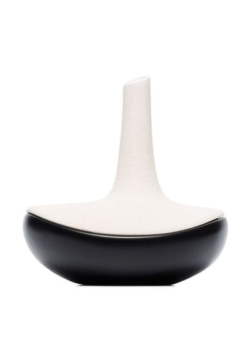 black and beige speckled ceramic dish