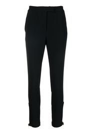 Blumarine buckled-ankle slim-fit trousers - Black