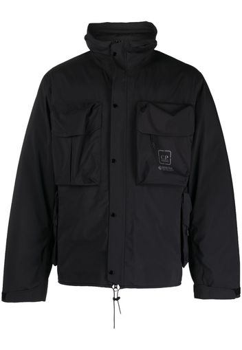 C.P. Company logo-print two-pocket windbreaker - Black