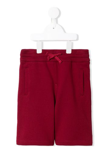 brand patch bermuda shorts