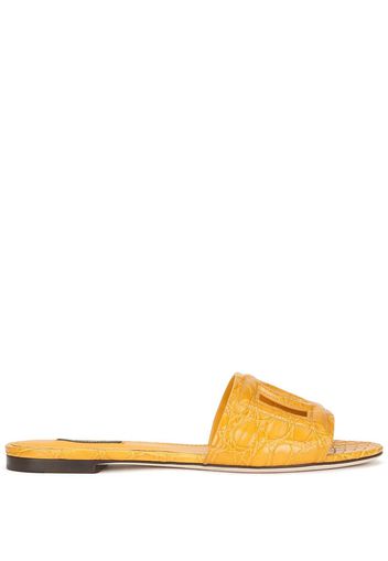 Dolce & Gabbana logo-embossed mule sandals - Yellow