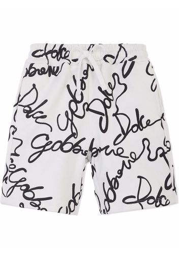 Dolce & Gabbana Kids all-over logo print shorts - White