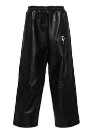Doublet crocodile-pattern leather track pants - Black