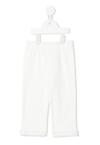 Familiar ruffle-hem trousers - White